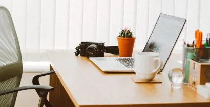 Image of a WFH home office desk and operators mesh chair with arms from office furniture suppliers Fieldskill